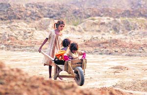 Even after 61 years of independence, a large number of poor children remain outside the school system.