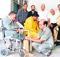 Artificial limbs being distributed by Mahavir Viklang Help Centre in Ludhiana on Thursday.