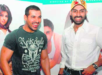 Bollywood actor John Abraham along with Abhishek Bachchan during the promotion of Karan Johar's film Dostana in Mumbai.