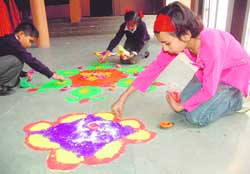 Students make rangoli at Kendriya Vidyalaya, Sector 31, Chandigarh.