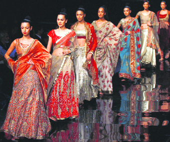 Models present creations by Varun Bahl during a fashion show at the Chivas in Fashion Tour-08 at New Delhi.