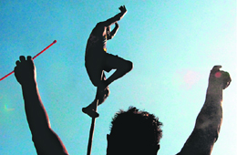 A rural sports player exhibits his skill during the Chandigarh Carnival in Chandigarh on Sunday.