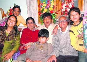 Capt Prabhat Goyal with his parents, wife and children at his residence in Dehradun