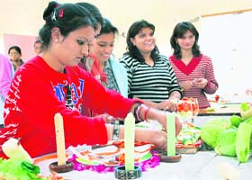 DEXTERITY AT WORK: Students of NIFD dish up a creative ensemble with greens Photo: Vicky Gharu