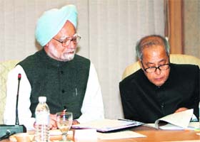 Manmohan Singh and Pranab Mukherjee at the all-party meeting in New Delhi