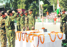 Students pay homage to the Mumbai terror attack victims on the Flag Day organised at KBDAV School in Sector 7, Chandigarh, on Thursday.