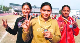 Taranjeet Kaur, Amandeep Kaur and Surjit Kaur, who bag top three positions in long jump in Ludhiana