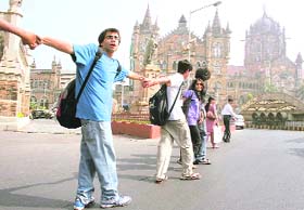 People form a human chain in front of Chhatrapati Shivaji Terminus railway station in Mumbai