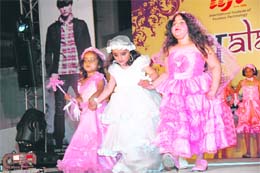 School kids walk the ramp at a fashion show organised by the International Institute of Fashion Technology, Dehradun