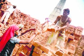 Labourers at a brick-kiln on the outskirts of Jammu