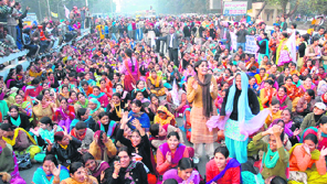 ETT teachers block the Bathinda-Goniana road in Bathinda on Thursday.