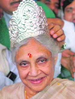 Sheila Dikshit became the Chief Minister of Delhi for the third consecutive time. Her supporters crowned her as she took the oath of office on December 17 — PTI