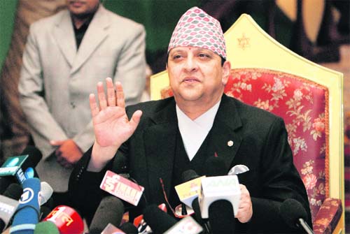 Nepal’s deposed King Gyanendra addresses the media at the Narayanhiti royal place in Kathmandu on June 11. Gyanendra vowed not to flee the country but to stay on and work for the good of the people — Reuters
