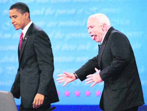 US Republican presidential nominee SenatorJohnMcCain (R) reacts to almost heading the wrong way off the stage after shaking hands with Senator Barack Obama at the conclusion of the final presidential debate at Hofstra University in Hempstead, New York, on October 15 — Reuters