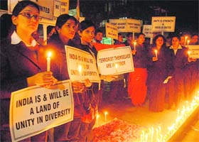 Students and staff members of the Touchstone Group at a condolence meeting to pay homage to the martyrs and victims of the Mumbai tragedy, in Sector 17, Chandigarh