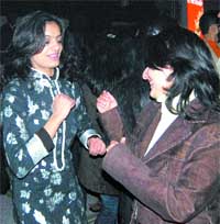 Girls dance during a party on the New Year eve in Amritsar
