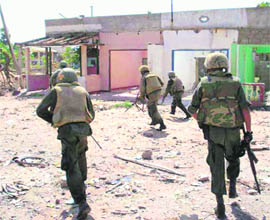 Sri Lankan troops enter the town of Paranthan, 280 km north of Colombo, while moving towards Kilinochchi