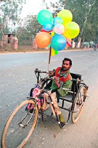 A differently abled person sells balloons in Jammu.