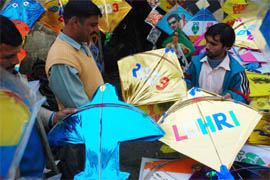 A vendor sells kites on Ladowali Road in Jalandhar on Thursday.