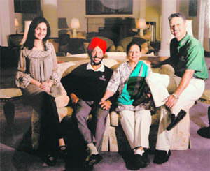 Jeev with his father Milkha Singh, mother Nirmal and wife Kudrat