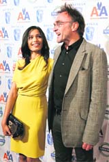 TWO TO TANGO: Actor Freida Pinto (L) and British director Danny Boyle of the movie Slumdog Millionaire arrive for BAFTA Annual Awards Season Tea Party in Beverly Hills, California, on Saturday.