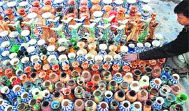 An artisan captures all the colours of the rainbowin his pottery collection.