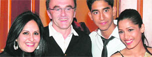 Slumdog director Danny Boyle (second from left) with actress Freida Pinto (right), actor Dev Patel (second from right) and co-director Loveleen Tandon.
