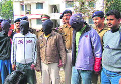 The accused in police custody.