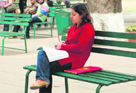 Oblivious to her surroundings, this girl remained immersed in her book at StuC.