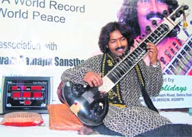 Surmani Agni Verma playing the sitar at Dehradun