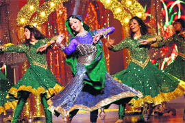 Bollywood actor Madhuri Dixit (middle) performs at NDTV and Toyota's Greenathon in Mumbai.