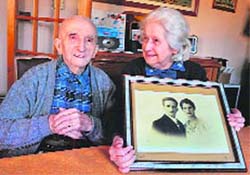 Jean, 106 years old, and Andree (right), 91, are pictured on Friday in their house in Merignac, central France. Jean and Andree have been in love every day for the past 71 years of their life together without a shadow of a doubt
