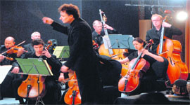 A medley of instruments brightened the stage as the Scottish Chamber Orchestra played at Samaagam—a music concert