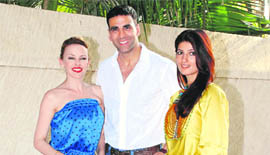 Australian singer Kylie Minogue, Akshay Kumar and his wife Twinkle Khanna (L-R) pose at Akshay’s residence in Mumbai. Minogue is in Mumbai to work on a music video for the Bollywood film Blue. The movie has its music score by Oscar winner A.R Rahman
