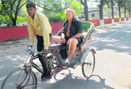 The heat is on. And there are visible signs to prove it. Like this foreign tourist who sports shorts as a rickshaw-puller takes him around the city on Tuesday.
