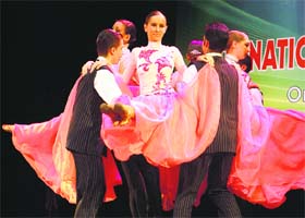 Colour meets coordination in this performance by ballet dancers in the city