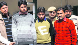 Students of Tanda Medical College who have been accused of murdering Aman Satya Kachroo being produced in the court at Dharamsala on Tuesday.