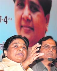 BSP chief Mayawati with BSP general secretary Satish Chandra Mishra during a press conference in New Delhi