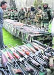 Seized arms and ammunition on display after the gunbattle at an Army base in Srinagar
