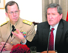 Richard Holbrooke with Admiral Mike Mullen (L) at a press conference on Wednesday.