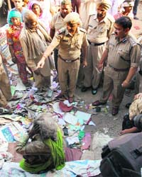 Cops inspect the blast site