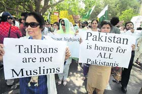 Pakistani citizens rally against the Taliban in Lahore