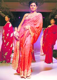 Miss India World 2009 Pooja Chopra walks the ramp PTI Photos: Kamal Kishore