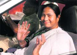 Trinamool Congress chief Mamata Banerjee leaves after attending a meeting on cabinet formation in UPA government, in New Delhi on Thursday