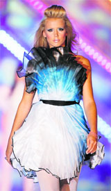 A model presents a creation by Maltese fashion designer Caroline Hili during the Malta National Fashion Awards.