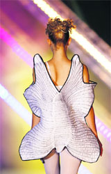 A model presents a creation by Maltese fashion designer Caroline Hili during the Malta National Fashion Awards.