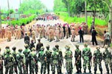 Army and police personnel deployed near Jalandhar on Monday.