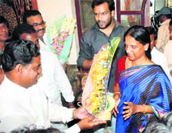 First woman home minister of Andhra Pradesh Sabita Indira Reddy being greeted by supporters in Hyderabad on Tuesday. 