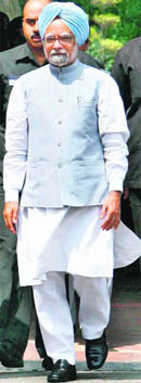 Prime Minister Manmohan Singh arrives at Parliament.