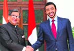 External Affairs Minister S.M. Krishna (L) shakes hands with his United Arab Emirates counterpart Sheikh Abdullah Bin Zayed Al-Nahyan at a meeting in New Delhi
